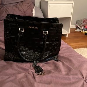 Black Michael Kors Snake skin detail with gold accents purse